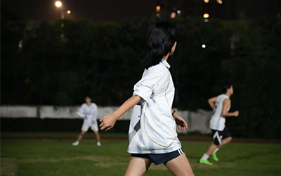 Playing frisbee with teammates